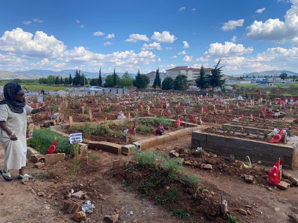 The loss of a Nation ; here a graveyards set in Islahiye ; relatives are still coming to term with their loss.